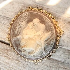 Vintage Resin Cameo Brooch:
Embracing Couple, Costume Jewelry